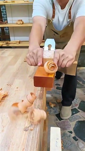 smoothing wood with a hand plane to create a flat surface on the edge of a timber board
