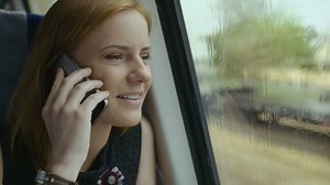 Talking on the phone while traveling - Free Stock Video