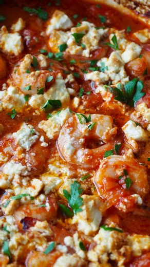 PRAWN SAGANAKI | https://www.maryskouzina.com/prawn-saganaki/ 🍅 If you’re craving that beachside taverna feeling…then you need to make this 🇬🇷☀️ Greek cuisine celebrates bold flavours with fresh, simple ingredients and that’s exactly how I enjoy cooking. Juicy prawns simmered in a rich tomato and white wine sauce, topped with golden, bubbling feta that melts into the most creamy, tangy finish. Take a bite, close your eyes and you’re seaside in Greece, salty air, warm sun, and a table made for