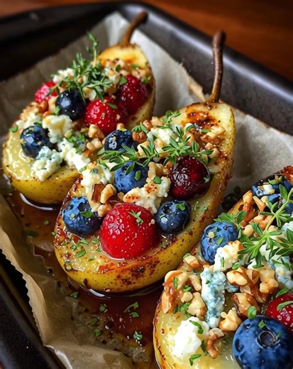 Baked Pears with Berries, Honey, Walnuts & Blue Cheese These Baked Pears with Berries, Honey, Walnuts & Blue Cheese are an elegant, sweet-savory dessert (or appetizer!) that’s warm, tender, and beautifully balanced—perfect for holidays, dinner parties, or a cozy night in. Why You’ll Love This Recipe Naturally sweet and wholesome Elegant yet incredibly easy Sweet salty flavor combo Perfect for entertaining Ingredients For the Pears 3 ripe pears (Bosc or Bartlett), halved and cored 2 tbsp butter, 
