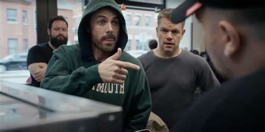 Watch Casey Affleck and Matt Damon attempt to rob a Dunkin' in new 'Instigators' promo