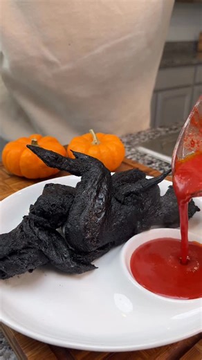 Keyshawn Hudson on Instagram: "👻 We’re serving up something wicked tonight: Black Chicken “Bat” Wings that are crispy, spooky, and perfect for your Halloween party spread, sponsored by @cafecasinolv 🦇🔥 #ad Turn up the vibes, grab a plate, and don’t be scared to get your hands dirty because flavor like this bites back. 😈 #CafeCasino #HalloweenEats #SpookySeason"