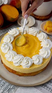 This Mango Mousse Cake is a perfect blend of creamy mango mousse, moist cake, and tangy mango curd, creating a dessert that’s as beautiful as it is delicious. 🥭 Check out this amazing recipe here: https://www.piesandtacos.com/mango-mousse-cake/ | Pies and Tacos