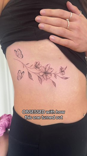 Flowy Rib Floral Tattoo Inspiration