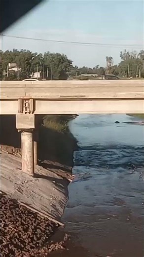View from the train of the progress on the new bridge, Provincial Route 7 and Peron Highway, More...