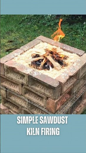 Firing pottery in a simple sawdust kiln #pottery #kiln