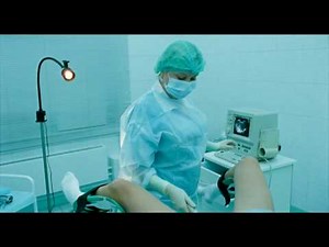 woman gynecologist in surgical gloves examines a girl/женщина гинеколог в хирургических перчатках