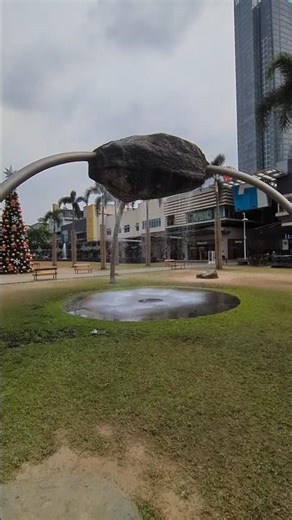 BGC's Specific Gravity consists of a suspended boulder and flowing water by Reg Yuson