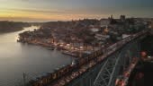 Aerial view of Porto cityscape showing trains crossing the Dom Luis I...