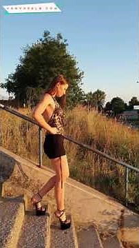 Pretty Teen Girl Walking in eXtreme Gold Metal Towering High Heels Sandals