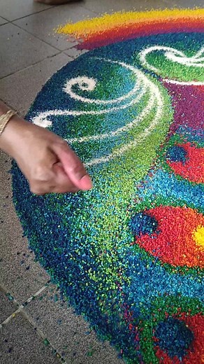 Beautiful Peacock Rangoli Kolam for Weddings
