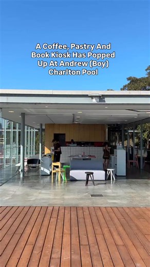 A coffee, pastry and book kiosk has popped up at @andrewboycharltonsydney pool for a three month residency this summer, brought to you by your mates from @artificercoffee (serving up batch brew, cold brew and tonic), @btwn.lns and @lunecroissant - - - [VD: a cafe at a pool serving coffee and pastries, with books on display.] | Urban List Sydney