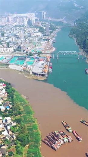 87K views · 9.6K reactions | Breathtaking confluence of two rivers in SW China's #Yunnan As the flood season arrives, a spectacular scene of clear and turbid waters has appeared at the confluence of the Jinsha River and the Hengjiang River in Shuifu City, Yunnan Province. 兩 #naturallandscape #China #Chinatravel | FlyOverChina | Facebook