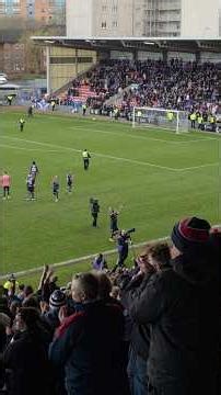 🥳 I'D RATHER STAY HOME IN KIRKCALDY. Raith Rovers players celebrate winning Challenge Cup with fans.