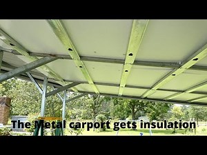 Insulating the metal carport roof.