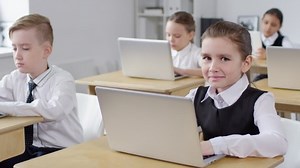clip-1033396547-waist-up-portrait-shot-preteen-caucasian-schoolgirl-dressed