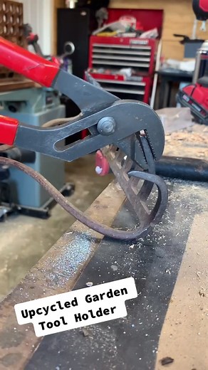 Upcycling an old broken rake into a tool rack for my gardening tools. #gardening #fyp #upcycling