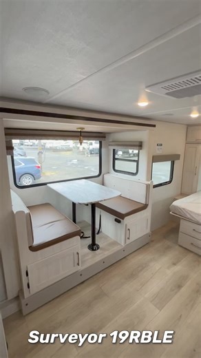 🚐✨ Discover the Forest River Surveyor Legend Sub-4,000LB Travel Trailer 19RBLE! ✨🚐This lightweight couple’s trailer offers amazing features:🔥 Outdoor Kitchen with Griddle🚿 Outdoor Spray Port🔒 Pass-Through Storage❄️ 10 Cu. Ft. 12V Refrigerator🍴 Large PantryResembling the 19MBLE layout, it boasts a queen-size bed up front instead of a Murphy bed. Have an overnight guest or two little ones? They can comfortably sleep on the dinette slide, and you’ll appreciate the privacy of the full rear bat