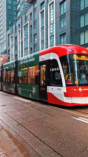 Reiner on Instagram: "A look at the TTC's Holiday Streetcar, which was unveiled today. The exterior of the streetcar has a special holiday wrap, while the interior of the streetcar features special coloured seats and candy cane coloured stanchions. Look for this special TTC streetcar along King Street, this holiday season. More information is available on the TTC's website. #toronto #tdot #the6ix"