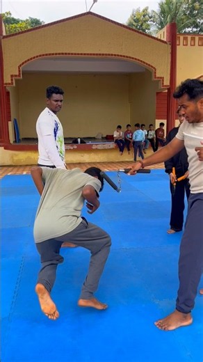Nunchaku Self Defense Trick: How to Escape a Hair Pull from Behind! 🥋💥