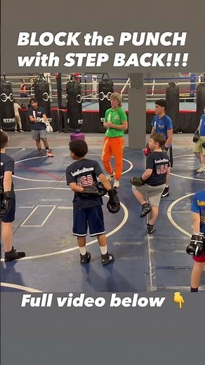 Boxing School by Coach Mike: Block the Punch with a Step Back!!! #shorts
