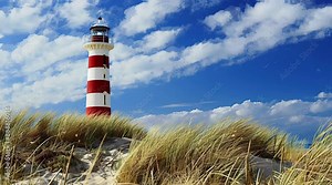Lighthouse standing majestically on a sand dune with a dramatic sky, guiding ships with its beacon Seamless looping 4k time-lapse virtual video animation Generated AI