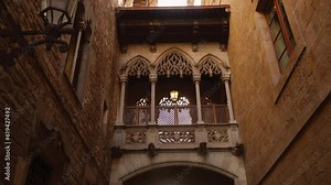 The Ponte del Bisbe, a striking Gothic-style bridge located in the Gothic Quarter of Barcelona, Spain, famous for its intricate stonework