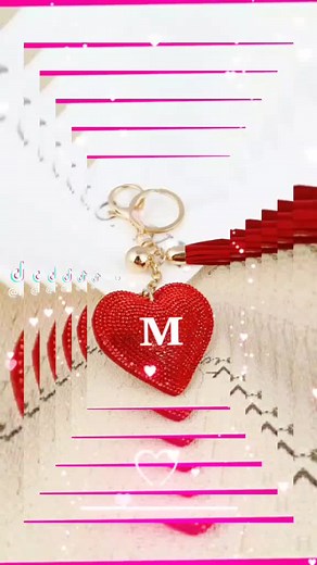 Heart-Shaped Keychain with Gold Tassel and Gemstones