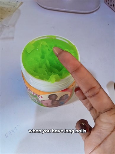 If you wear press on nails gel nails or acrylic nails you need this trick. Get Pressing from us Long nail girls know the struggle. You try to scoop Vaseline or lip balm and your nail goes inside the product. The whole container becomes messy. Here is a simple nail hack using press on nails. Use the side of your nail to scoop a small amount instead of digging inside. Your Vaseline stays clean. Your nails stay clean. This beauty trick works for girls who wear press on nails, acrylic nails, gel nai