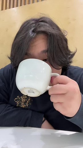 Casual Coffee Moments: Enjoying a Sip Indoors