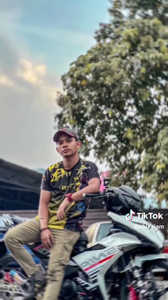 Sporty Motorcycle Rider at Racing Track Event