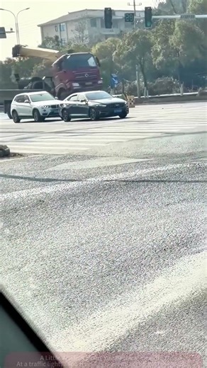 Truck with Rear Wheels Off Ground: Nearby Cars Are Terrified!