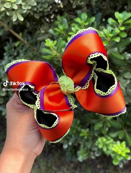 Large (6”) 4 layer boutique ribbon bow on clip Halloween colors $34 shipped in box. To claim please pm paypal email or follow us on fb. Turn around time is 3-5 business days. If you’d like to purchase the sample bow price is $30 shipped because of the following issue (small tear in lace at bottom)