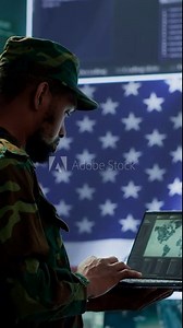 Vertical Video US soldiers operating in a high tech cybersecurity command post, managing state secrets and classified information. Protecting servers against digital threats and cyber warfare. Camera