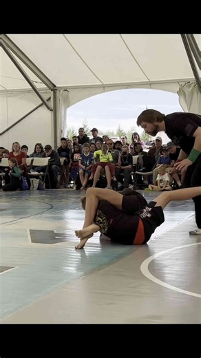 Intense Grappling Match Showcases Skill and Determination