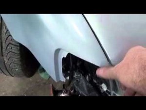 How do you replace the front fender of the Volkswagen Passat?