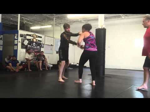 Woman grapples in men's absolute division no gi tournament