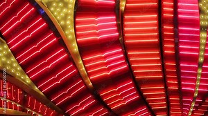 Las Vegas Neon Lights close-up. Neon flashing lights of Las Vegas Casino. Flashing neon light on the famous Las Vegas Strip. Bright night entertainment and advertisement at resort hotel and casino.