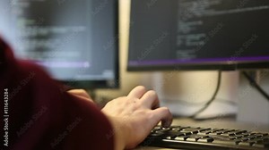 Man programmer writes code using the keyboard. Hands close-up Stock Video