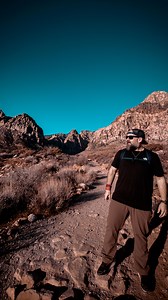Desert hiking is a different game, and I learned that the hard way. If you are coming from the Pacific Northwest or anywhere with lots of shade and obvious trails, here are three things to keep in mind before you head out to places like Red Rock Canyon outside of Las Vegas. 1. The sun will get you even when it feels cool. There is not much cover out here, so sunscreen matters, and so do simple things like a hat, sunglasses, a neck gaiter, or a sun hoodie. 2. Hydration is not optional. Bring more