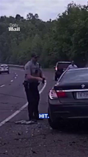 Cop narrowly avoids out of control car