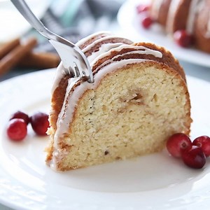 This OVERNIGHT EGGNOG COFFEE CAKE is a delicious way to celebrate the mornings during the holiday season! Recipe here: https://www.recipegirl.com/overnight-eggnog-coffee-cake-with-nog-glaze/ | RecipeGirl