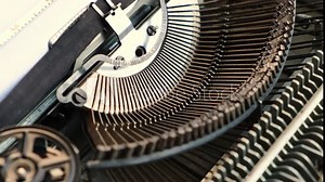 Mechanism of the alphabet typing on the old retro typewriter.