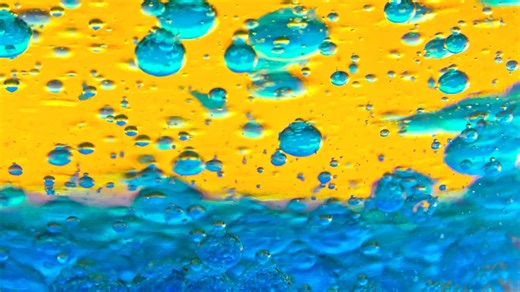 Colorful texture of a thick blue liquid - Free Stock Video