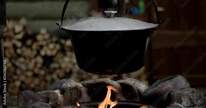 Boiling Traditional Hungarian Dish - Bogracs Goulash, Stewed Meat and Vegetables in Cauldron, Outside