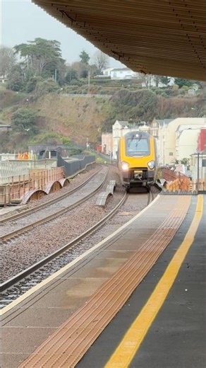 Cross country class 220 glides through Dawlish Station on the Plymouth to Bristol TM 220019 voyager
