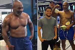 Mike Tyson shows off ripped physique in gym workout with MMA legend Vitor Belfort