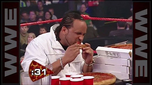 The only correct way to celebrate National Pizza Day. ⬇️ | WWE