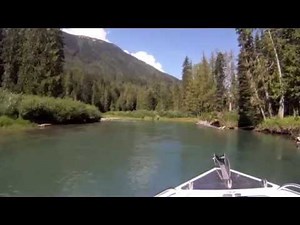 North River jet boat dodging logs