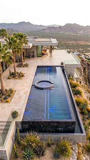 The moment a luxury infinity pool comes to life on the edge of a cliff